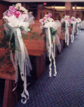 pink and white pew decorations