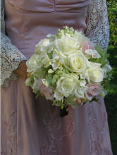 Delicate  lacy roses, phlox, ivy, and hydrangea