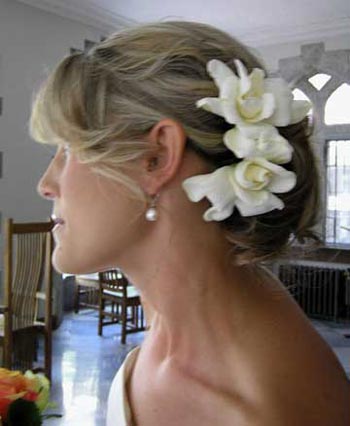 White gardenias make a gorgeous hair piece