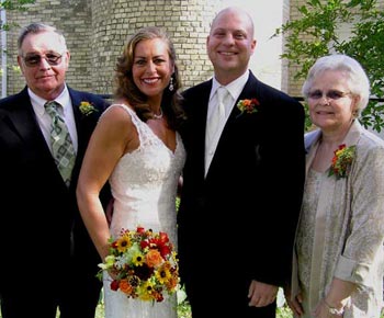 Bride with groom and family